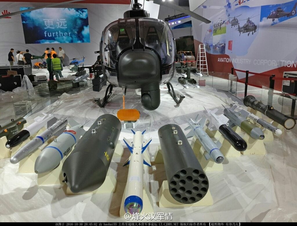 China Z-11WB Scout Helicopter Zhuhai 2016 with smart bombs, laser guided anti-tank missiles, jamming pods and machine guns
