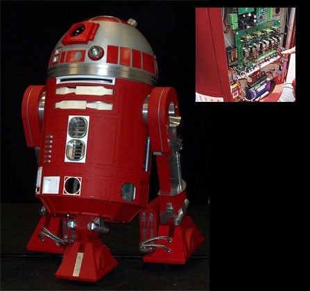 A red, all-metal, homemade R2-R9 droid from Episode I of the Star Wars series.