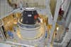 The first completed crew module for NASA’s new Orion space craft sits on top of its service module at the Kennedy Space Center in Florida. In December, Orion will ride a Delta IV Heavy rocket to 3,600 miles above Earth.