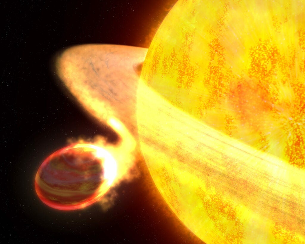 WASP-12b, 1,100 light-years from Earth, is being slowly pulled apart by its star. In fact, it orbits so close that its tidal forces are pulling away its upper atmosphere at a rate of nearly 200 quadrillion tons each year, turning it into an egg-shaped ball of super-hot carbon. Planetary scientist James Lissauer suspects that deep below the turbulent shield, this Jupiter-sized planet might contain rocks made of graphite or even diamond.