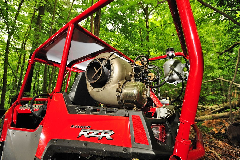 A jet turbine on an ATV in the forest.