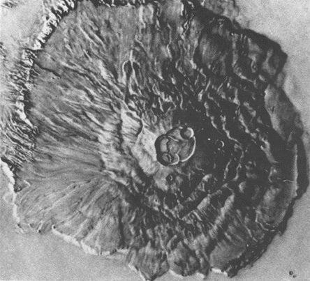 Mariner 9's view of Olympus Mons, which is about three times as large as Mount Everest.
