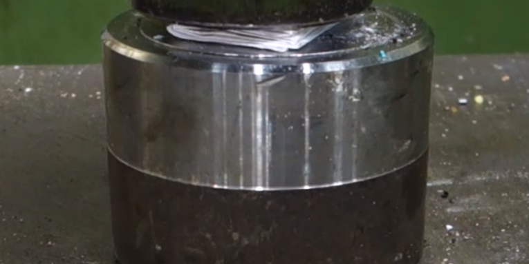 Why This Piece Of Paper ‘Exploded’ In A Hydraulic Press