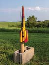 a rocket launch in an alfalfa field