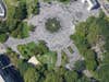 paved circle in crowded park