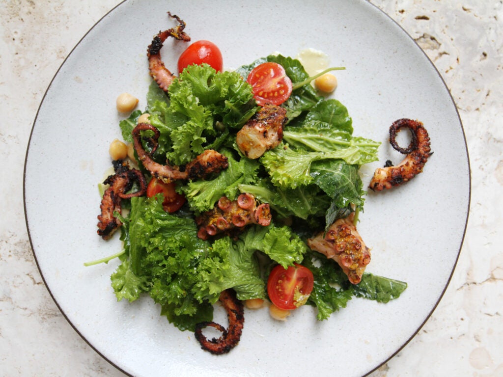 Grilled Octopus with Chickpeas, Tomatoes and Anchovy Vinaigrette