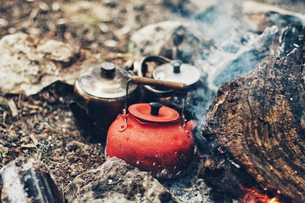 Boiling kettles on the fire