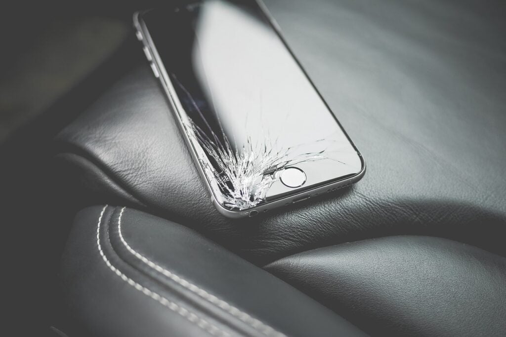 Cracked Apple iPhone screen for repair