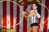 circus performer twirling hula hoops