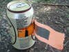 Fill your emptied beer can with a DIY survival kit.