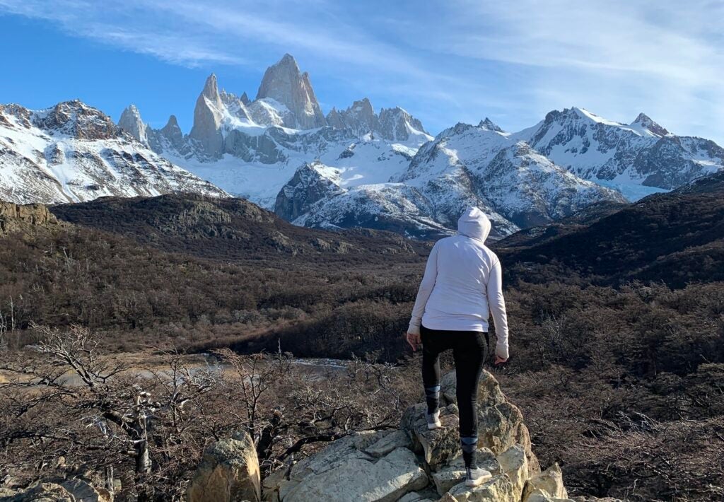 person hiking on torres del paine