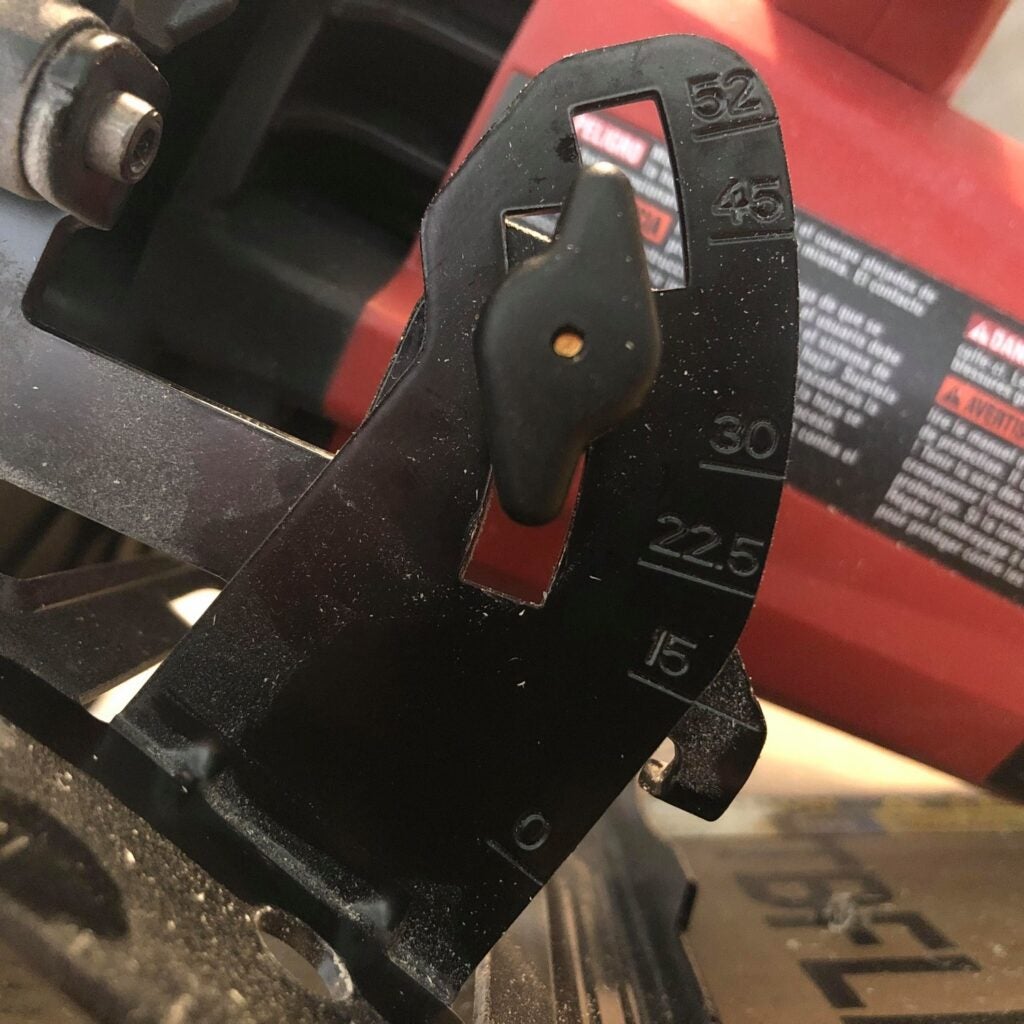 a close-up of the blade angle settings on a circular saw