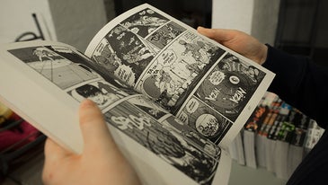 graphic novel in hands