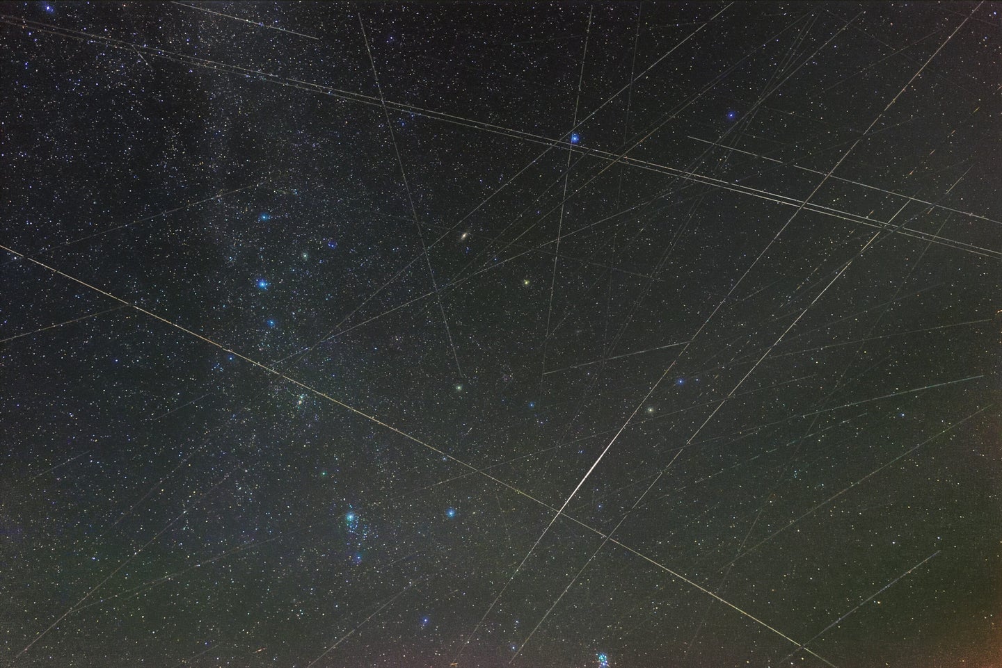 satellite streaks of light in a German sky