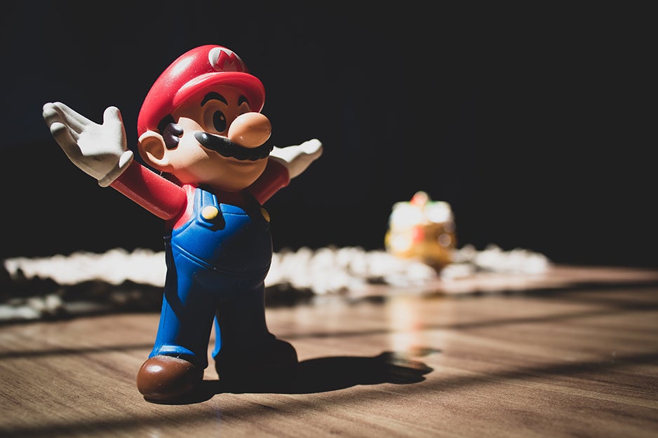 Mario figurine on a table.