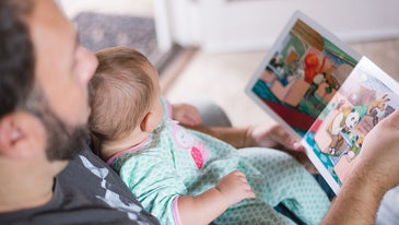 guy reading to his child
