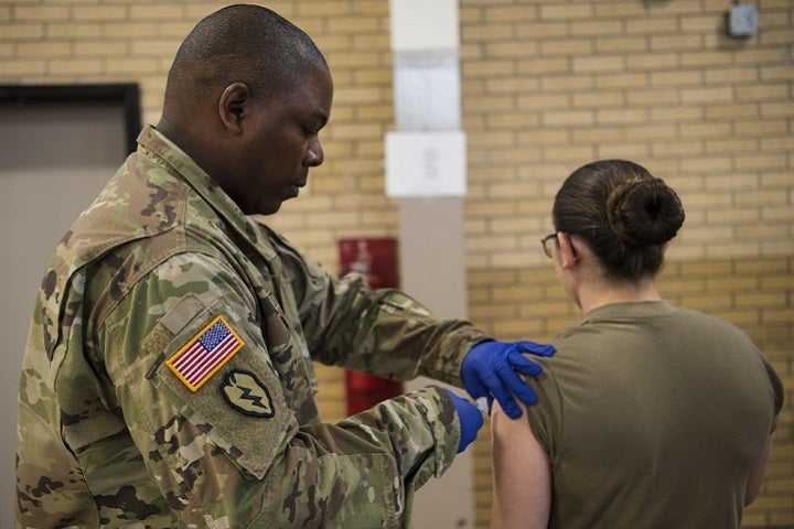 A U.S. service member gets a flu vaccination.