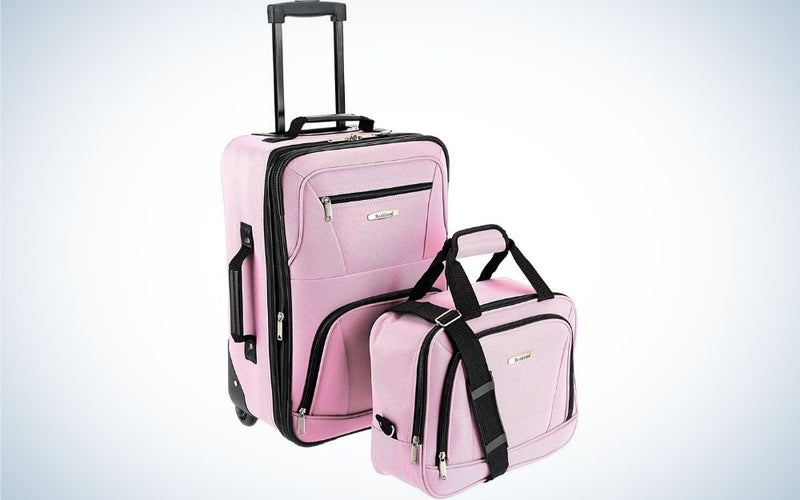 2 Pink luggage with two wheels and without wheels with telescoping and side grip handles from front.