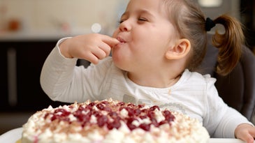 kid eating cake