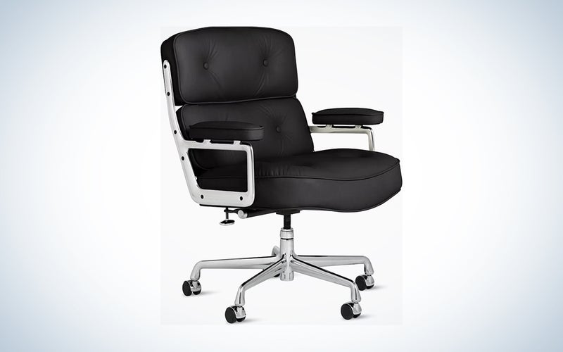 A black executive Eames chair on a blue and white background