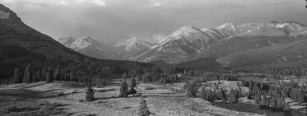 panoramic image of mountains in black and white