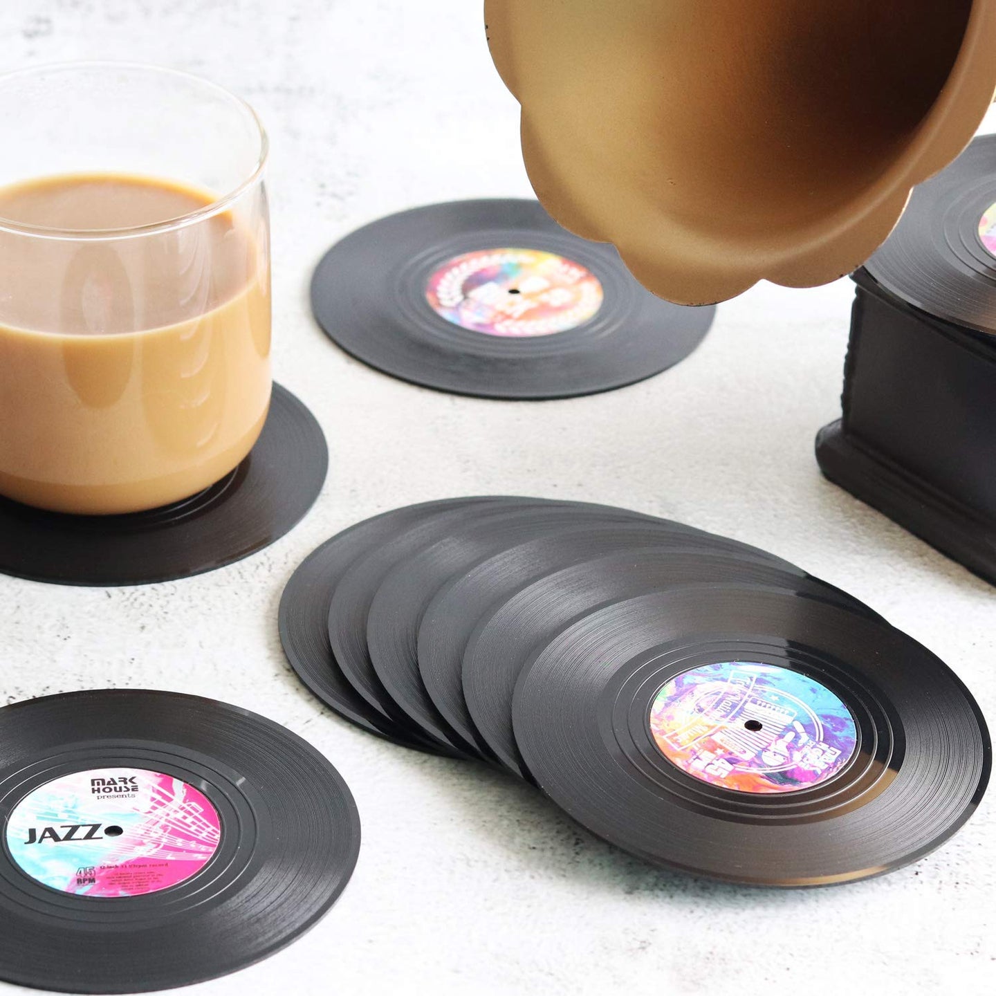 vinyl coasters on a table
