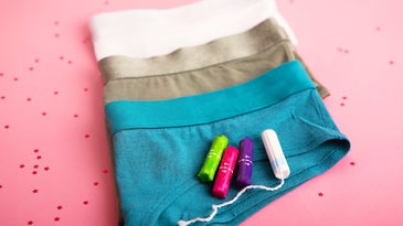 underwear and tampons on a pink background