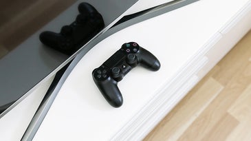 PS4 controller near a TV
