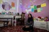 Mirna al-Sabbah, who dreams of becoming an astrophysicist, in her bedroom