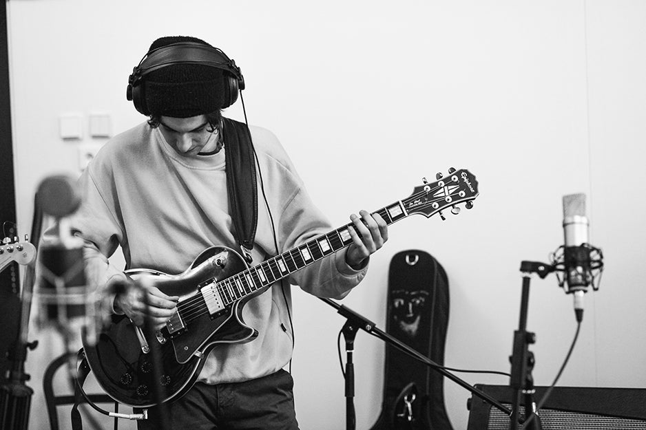 guitarist with headphones