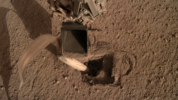 At long last, NASA’s probe finally digs in on Mars