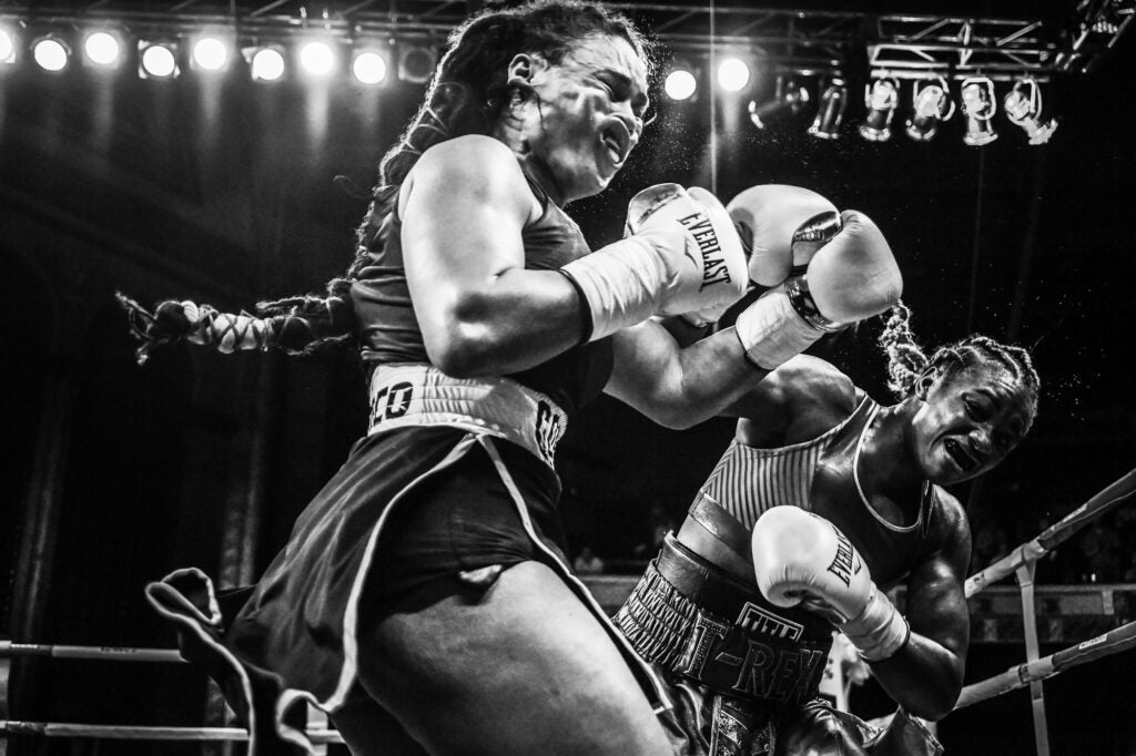 Terrell Groggins - Olympic middleweight boxing champion Claressa Shields (right) spars with Hanna Gabriels in a match at the Masonic Temple in Detroit,