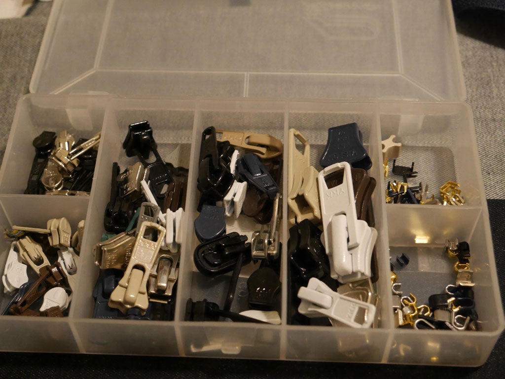 a box of zipper replacement parts