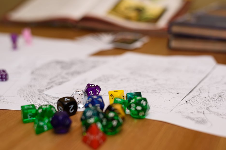 Polyhedral dice on a table