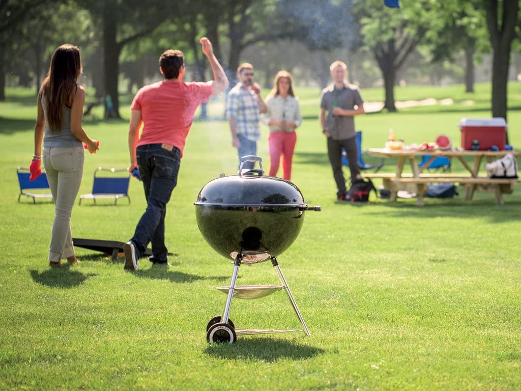 grill in a park with people