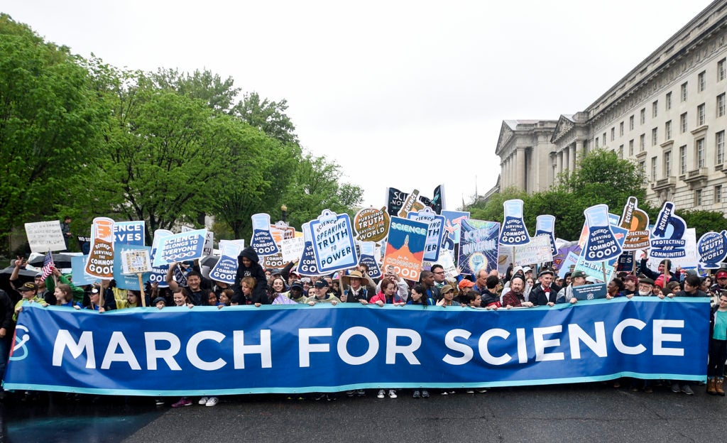 a group of people participating in the 2017 March for Science in Washington, D.C.
