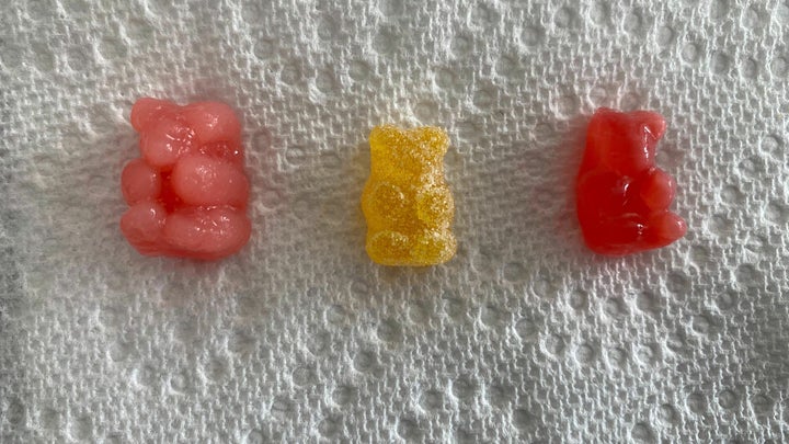 Three gummy bears on a white paper towel