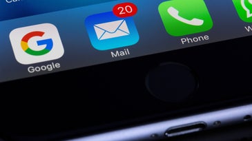 a phone with the Apple Mail app visible, with some notifications