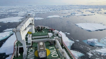 ship deck looking over icy water