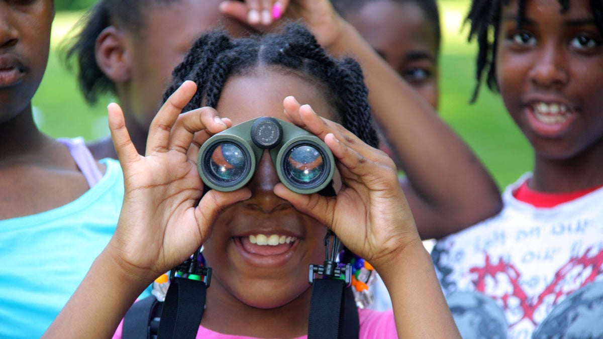 Black kids with binoculars