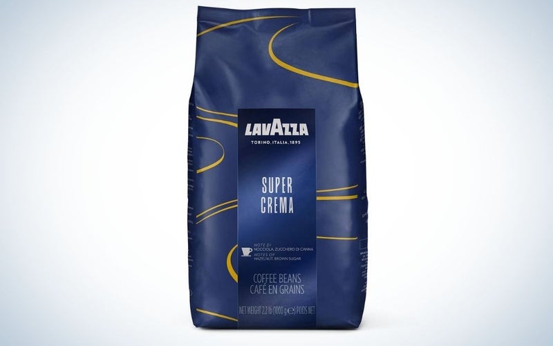 A blue box with golden line into the package with the logo of Lavazza in front of it.