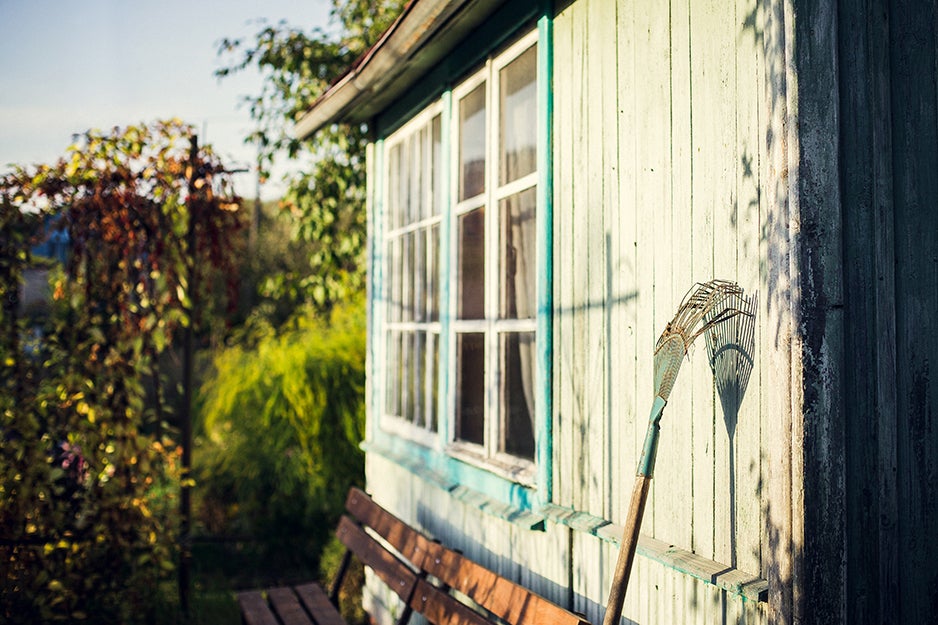 rake leaning against a house
