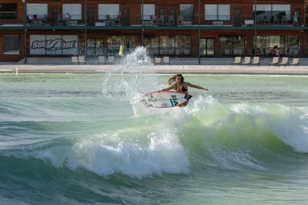 Brianna Cope crests the surf at the Waco park