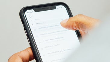 a person using their phone to search for things