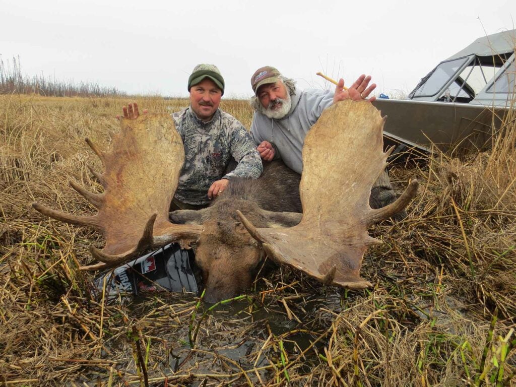 Steve Overguard and a client with an Alberta moose.