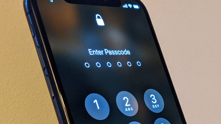 a locked iPhone showing its lock screen