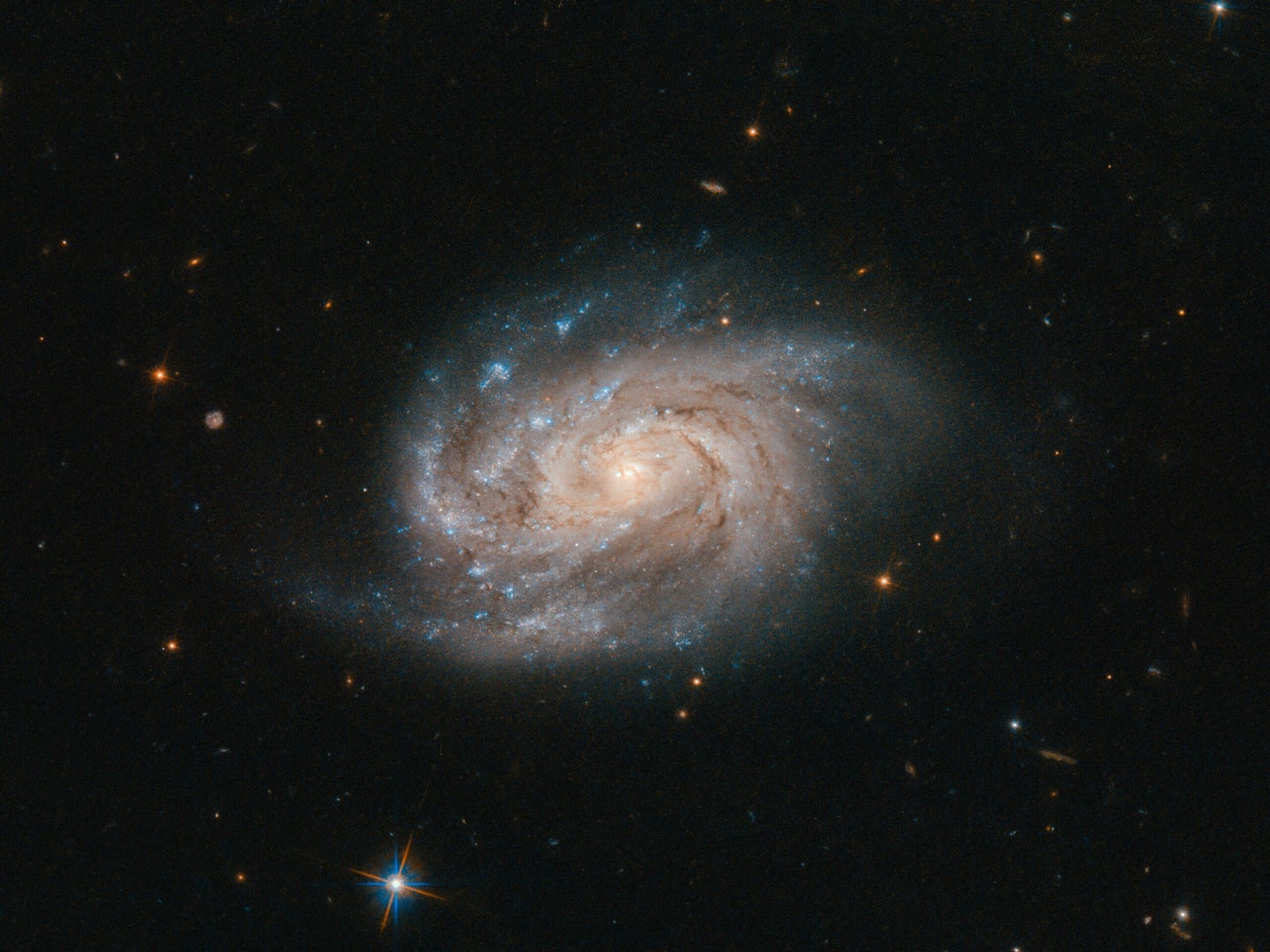 A galaxy named NGC 1803 as imaged by the Hubble Space Telescope.