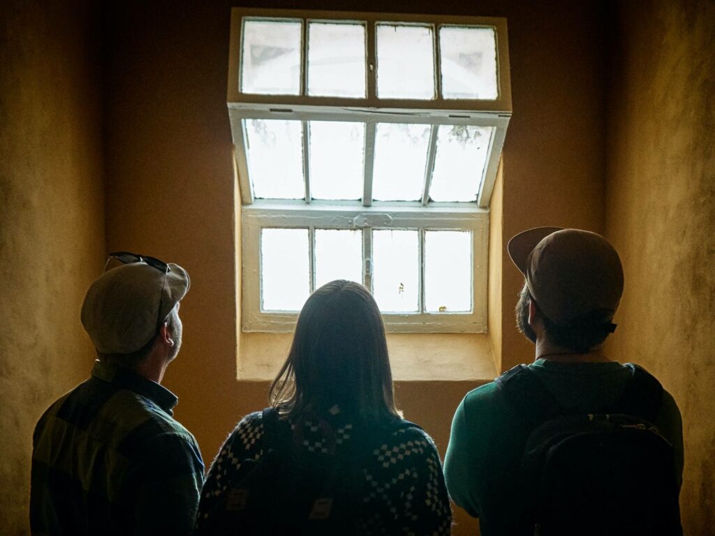 People looking at window