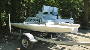 The finished boat hooked up to Riti's trailer