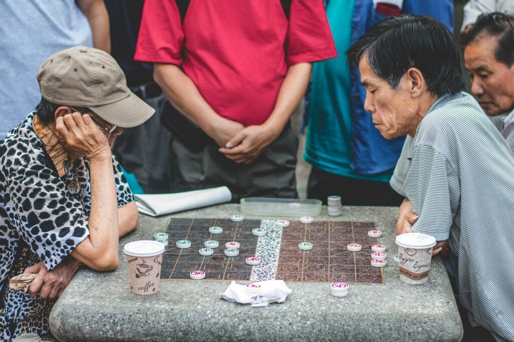 Residents in NYC's Chinatown play banqi